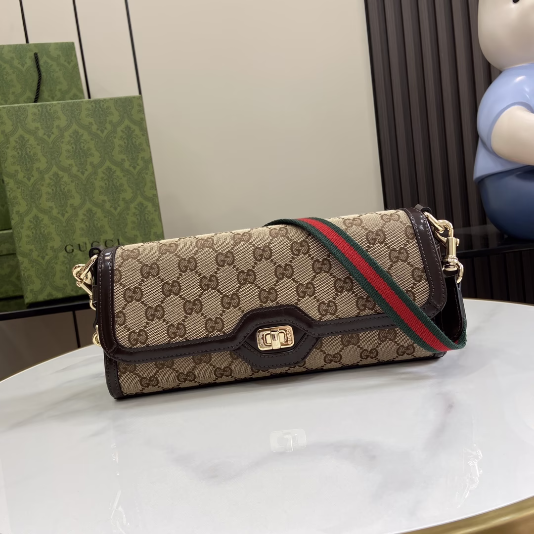 p1160🎁🎁Gucci Luce series small shoulder bag, Gucci Luce series bags exude a strong sense of playfulness and fun, "Luce" means "light" in Italian. Classic GG canvas charm interpretation of the small shoulder bag Dark brown leather piping and light gold-tone accessories make the beige and ebony pattern more charming. The adjustable and detachable red and green striped ribbon passes through the leather rings on both sides and is tied to the accessory ring, giving this bag more functionality and structure. Beige and ebony classic GG canvas, with a loom-woven cotton base, brown leather piping, light gold-tone accessories, cotton and linen blend lining, interior: a zipper pocket with Gucci badge zipper pull, detachable web shoulder strap (26 cm high) turn lock, weight: about 0.55 kg model: 786027 size: 12.5 (length) x 27.5 (width) x 6.5 cm (thick) Color: Brown/Canvas Made in Italy Model is 176 cm tall Maximum capacity: iPhone Pro Max/Plus, Airpods, small wallet and lipstick - Replica bags