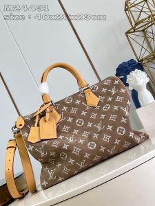 P2900 M24431 Brushed and Embroidered Almond Leather The Speedy P18 Bandoulière 40 Monogram Leather is a soft grained cowhide wrapped in sheepskin lined with a silk-screened Monogram pattern for a misty, canvas-printed look that speaks to Creative Director Pharrell Williams's new seasonal vision. 40 x 26 x 23 cm (L x H x W). 23 cm (L x H x W)This item is too large to be packaged.