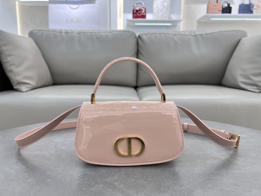 Small 30 Montaigne Avenue Top Handle White Patent Cowhide No. M9370UNQA This 30 Montaigne Avenue Top Handle is a new addition to the Winter 2014 Ready-to-Wear collection, showcasing elegance and modern style in beautifully crafted, durable and richly textured blue patent cowhide. Dior's craftsmanship is evident on the flap embellished with a vintage gold-tone metal CD logoDouble compartment with sewn-in triangular liningAn additional back pocket for added practicalitySmaller version with leather top handles and adjustable, removable shoulder strapCan be carried by hand, over the shoulder or cross-bodyFront embellished with the CD logoFlap closureLeather top handlesAdjustable, removable leather shoulder strapTwo interior compartments2 internal slit pocketsBack pocket with dust bag PouchMade in ItalyModel No.: 6530Size: 19 x 9 x 8-High Fake Factory