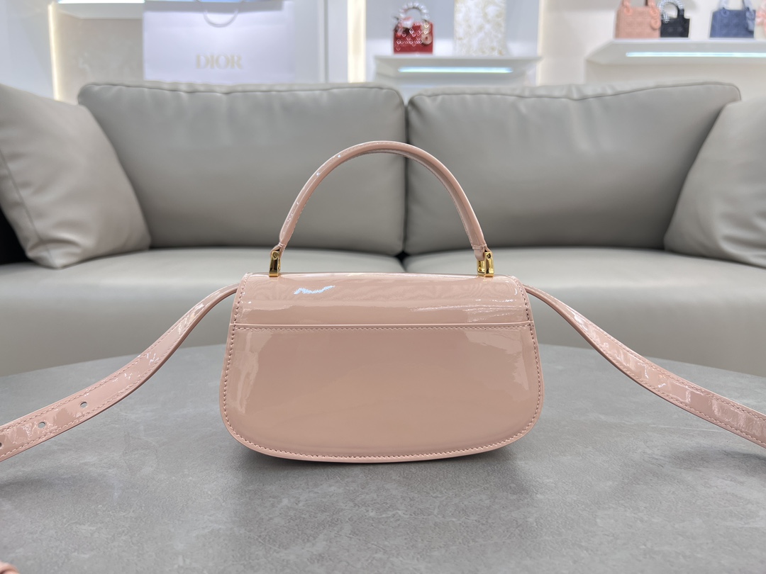 Small 30 Montaigne Avenue Top Handle White Patent Cowhide No. M9370UNQA This 30 Montaigne Avenue Top Handle is a new addition to the Winter 2014 Ready-to-Wear collection, showcasing elegance and modern style in beautifully crafted, durable and richly textured blue patent cowhide. Dior's craftsmanship is evident on the flap embellished with a vintage gold-tone metal CD logoDouble compartment with sewn-in triangular liningAn additional back pocket for added practicalitySmaller version with leather top handles and adjustable, removable shoulder strapCan be carried by hand, over the shoulder or cross-bodyFront embellished with the CD logoFlap closureLeather top handlesAdjustable, removable leather shoulder strapTwo interior compartments2 internal slit pocketsBack pocket with dust bag PouchMade in ItalyModel No.: 6530Size: 19 x 9 x 8-High Fake Factory