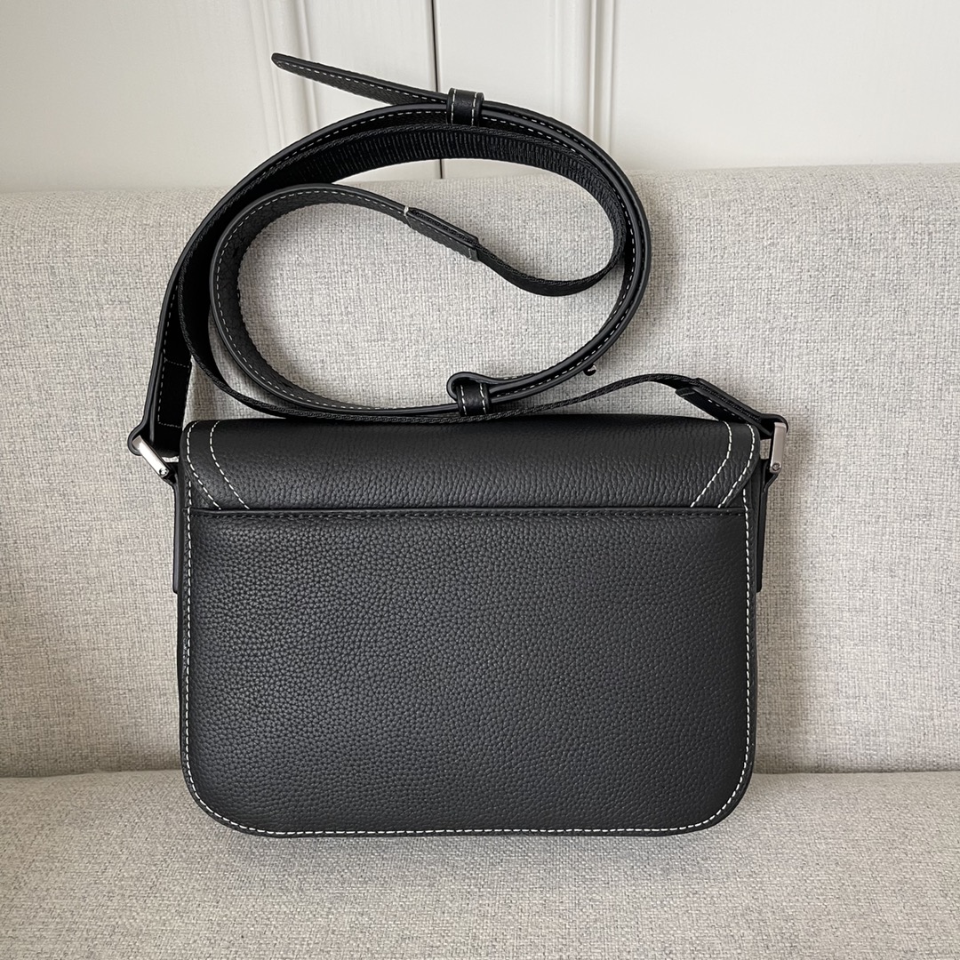Image [2]-This saddle bag with shoulder strap is the season's smartest and most stylish crafted in black grained cowhide leather with contrasting stitching and a saddle-inspired flap embellished with an aluminum clasp for a touch of styleMiniature style with a spacious interior and a patch pocket for added sophisticationCan be worn on the shoulder or cross-body with an adjustable leather and Christian Dior jacquard shoulder strapModel no. D8016Size 23-18-6Black grained cowhide with contrasting stitchingDior logo embossed on the insideAdjustable leather and nylon Christian Dior logo jacquard shoulder strapFlap closureAluminum buckle with Christian Dior logo and CD initialsInterior patch pocketInterior patch pocket with dust bagMade in Italy191701100-High-quality bags
