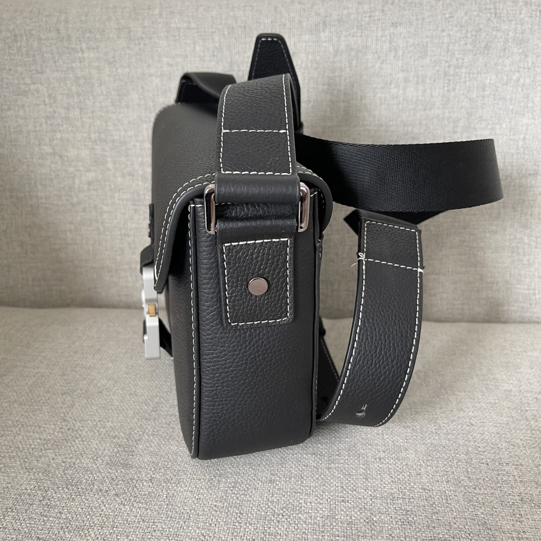 Image [3]-This saddle bag with shoulder strap is the season's smartest and most stylish crafted in black grained cowhide leather with contrasting stitching and a saddle-inspired flap embellished with an aluminum clasp for a touch of styleMiniature style with a spacious interior and a patch pocket for added sophisticationCan be worn on the shoulder or cross-body with an adjustable leather and Christian Dior jacquard shoulder strap Model. D8016Size 23-18-6Black grained cowhide with contrasting stitchingDior embossed logo on insideAdjustable leather and nylon Christian Dior logo jacquard shoulder strapFlap closureAluminum buckle embellished with the Christian Dior logo and the initials CDInterior patch pocketInterior patch pocket with dust bagMade in Italy191701100-High-quality bags
