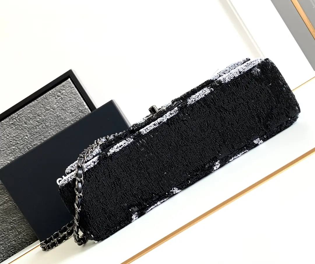 CHANEL 24S black and white panda beaded CF beautiful fried black and white sequins out of a panda sense of both bright shiny colorful black super cool black lining is also used black sheepskin feel very goodWith silver hardware black sheepskin overall everywhere exudes a sense of high class cool feelingCan be shoulder can be crossbody double chain can also be underarm back official website size: 25cm