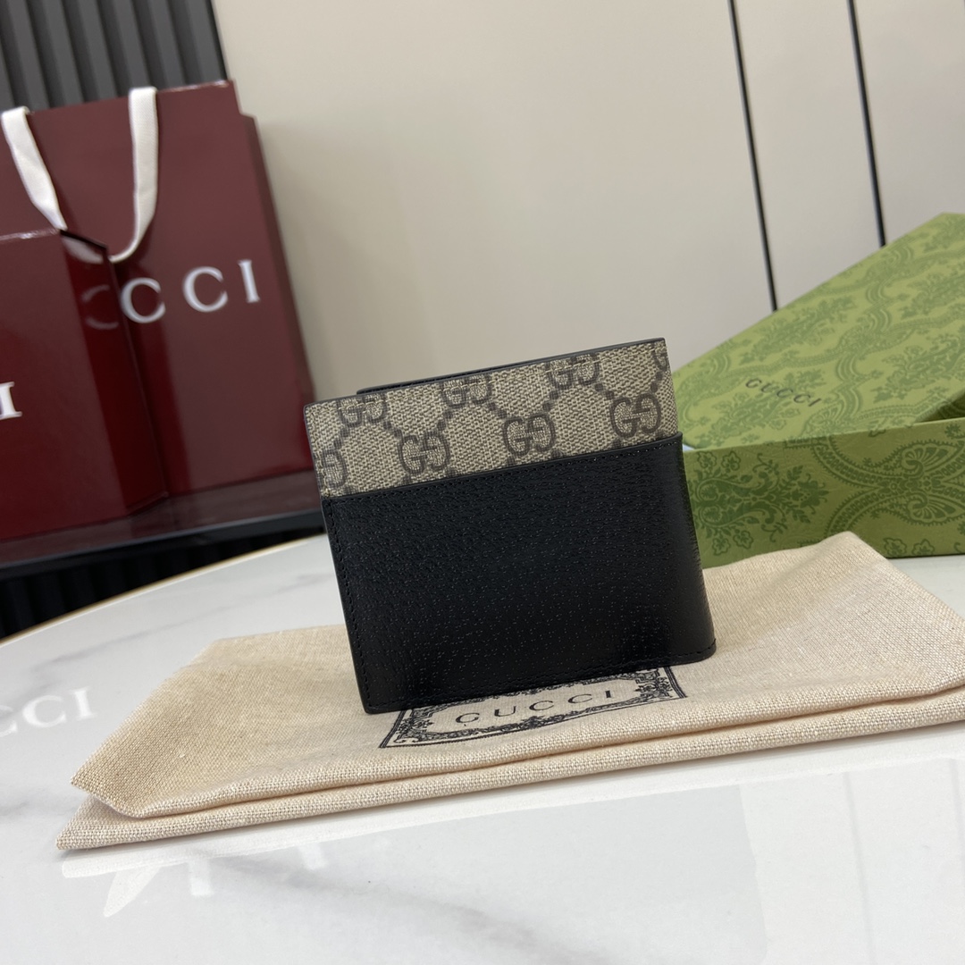 p380 The Gucci Interlocking Double G Wallet has been an integral part of Gucci's collections since its inception in the 1960s. The logo, derived from the initials of the House's founder, Mr. Guccio Gucci, continues to be reinvented in a variety of forms and styles, and in this leather and GG Supreme canvas wallet it is presented with openwork details that create a contemporary and classic look with accessories in black and brown GG Supreme canvas, black leather piping and cloud fabric lining. This wallet in leather and GG Supreme canvas features cut-out details to create a modern and classic accessory Black and brown GG Supreme canvas Black leather piping Cloud fabric lining Interlocking double G cut-out details Interior: 8 card compartments 2 bill compartmentsModel Number: 701420Dimensions when closed: 11 (W) x 9cm (H)Size when open: 21 (W) x 9cm (H)Color: black leather/pvcItalian Creation
